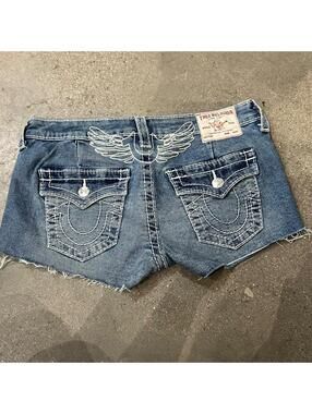 y2k true religion low rise shorts with angel wing detail